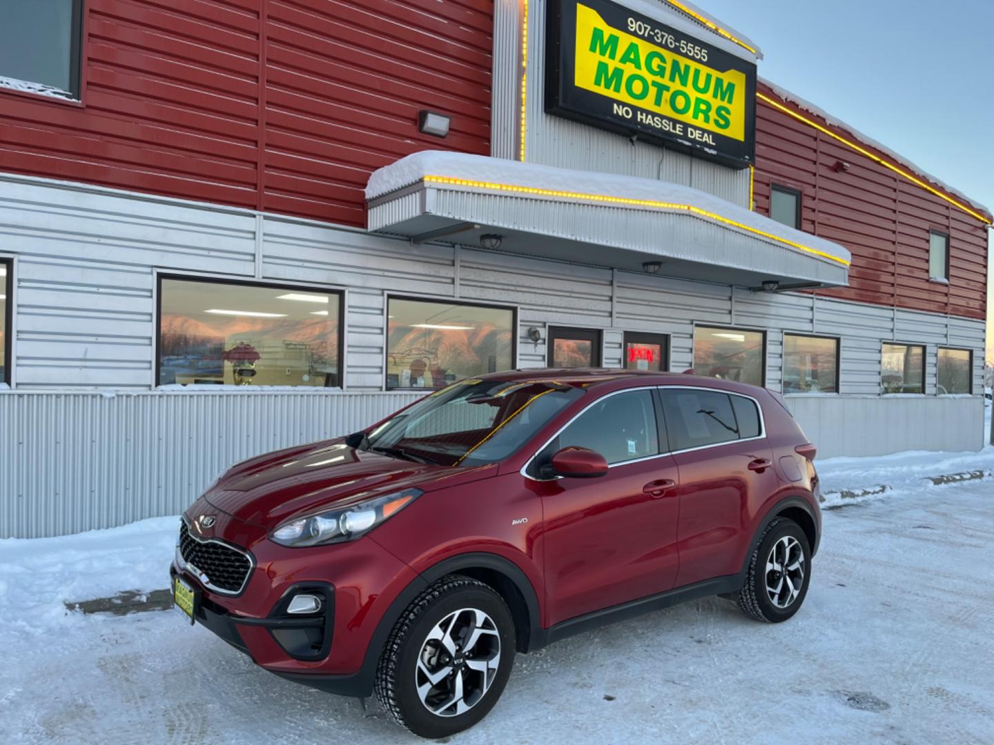 2021 Red /black Kia Sportage LX AWD (KNDPMCAC8M7) with an 2.4L V6 DOHC 24V engine, 6A transmission, located at 1960 Industrial Drive, Wasilla, 99654, (907) 274-2277, 61.573475, -149.400146 - Photo#0